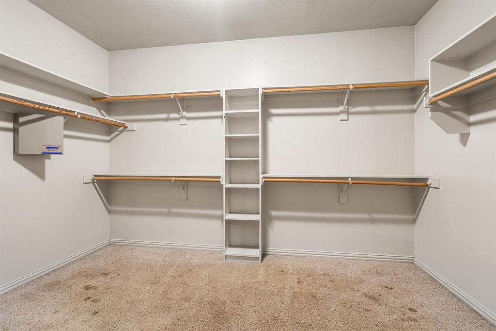 6210 Deer Run Road Sanger, TX 76266 - Photo 22 of 40 a view of an empty walk in closet