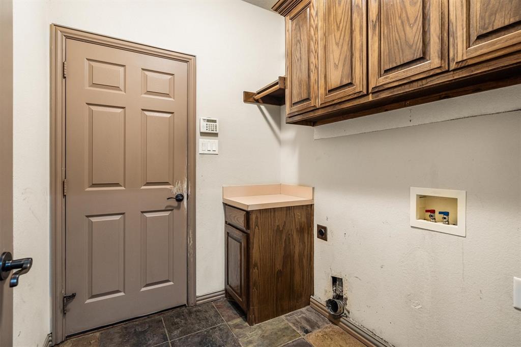 6210 Deer Run Road Sanger, TX 76266 - Photo 26 of 40 a view of a storage and utility room
