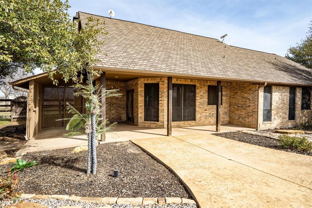 6210 Deer Run Road Sanger, TX 76266 - Photo 29 of 40 a front view of a house