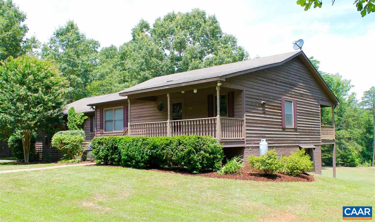 4508 Deer Bonn Road Keswick, VA 22947 - Photo 1 of 28 a house that has a lot of plants in it