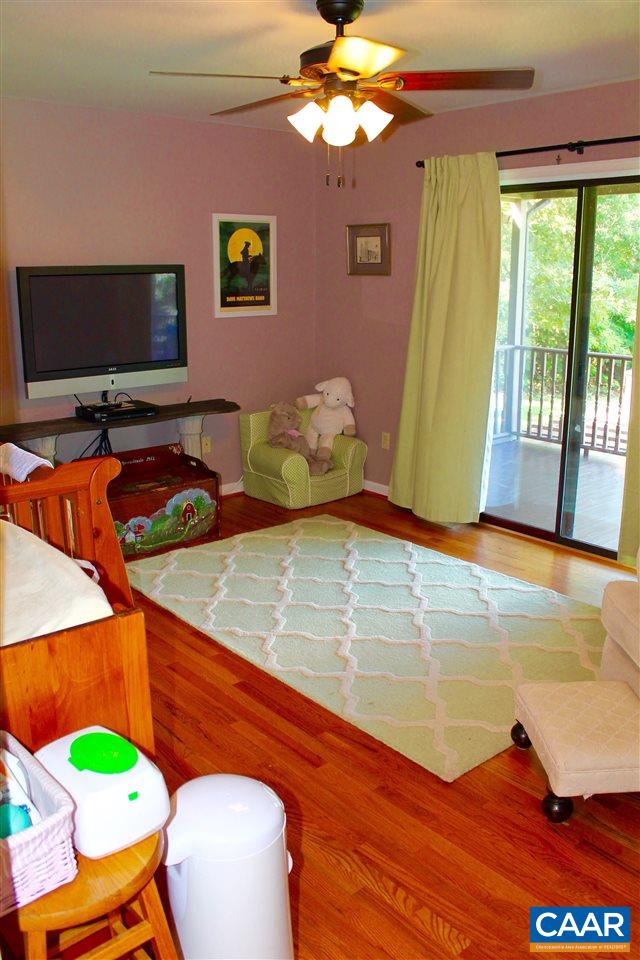 4508 Deer Bonn Road Keswick, VA 22947 - Photo 19 of 28 a view of a livingroom with furniture and window