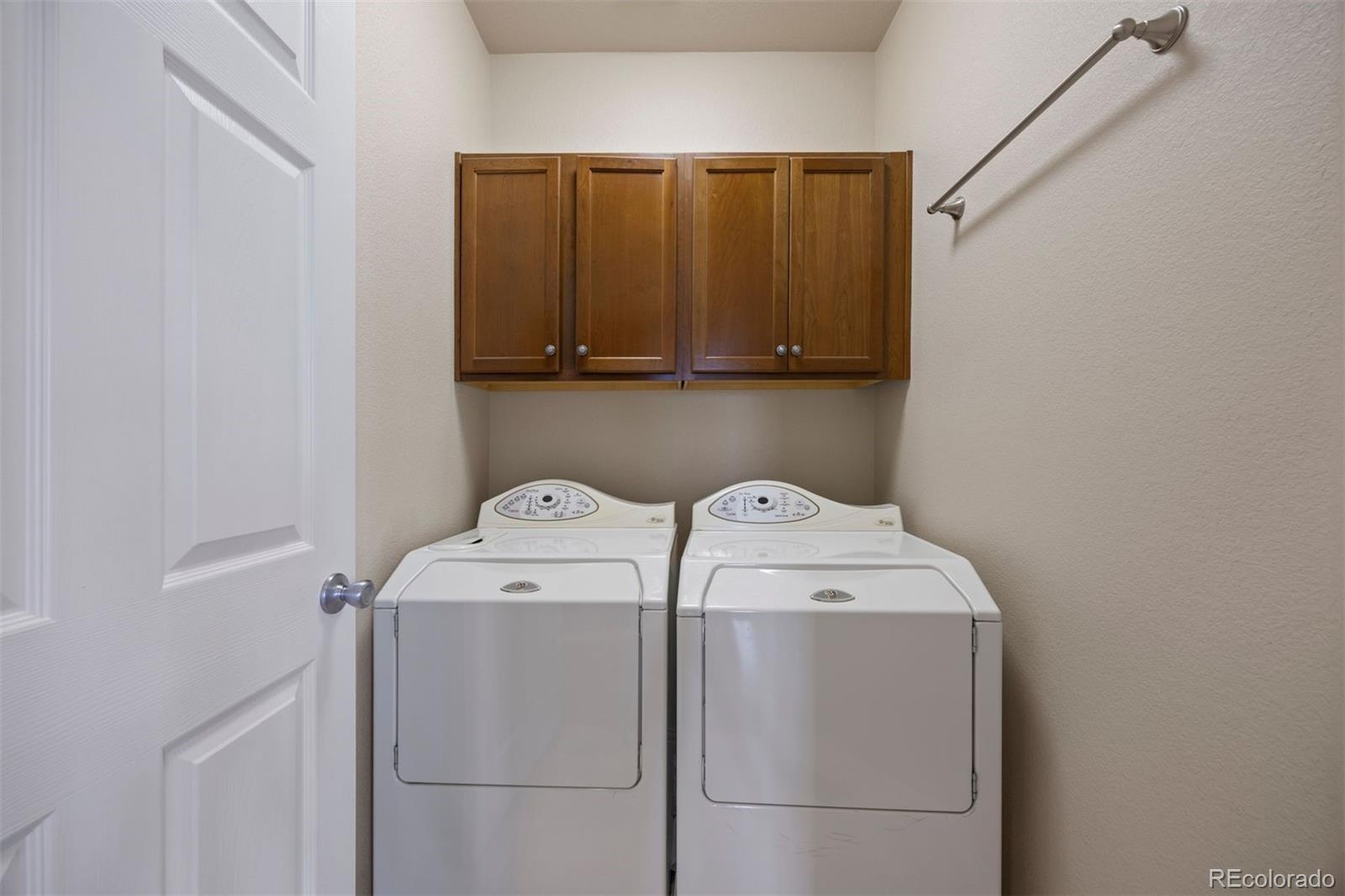 3519 Zane Grey Loop Parker, CO 80138 - Photo 36 of 40 a utility room with dryer and washer