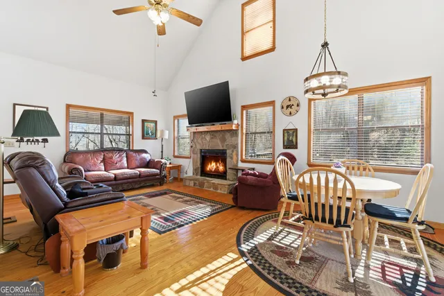 a view of a livingroom with furniture window and wooden floor