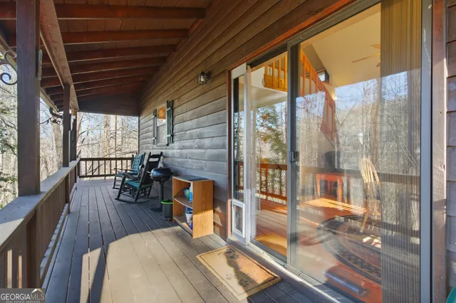 a kitchen with stainless steel appliances a refrigerator sink and cabinets
