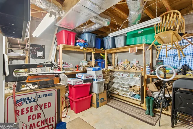 a view of a porch with chairs and backyard
