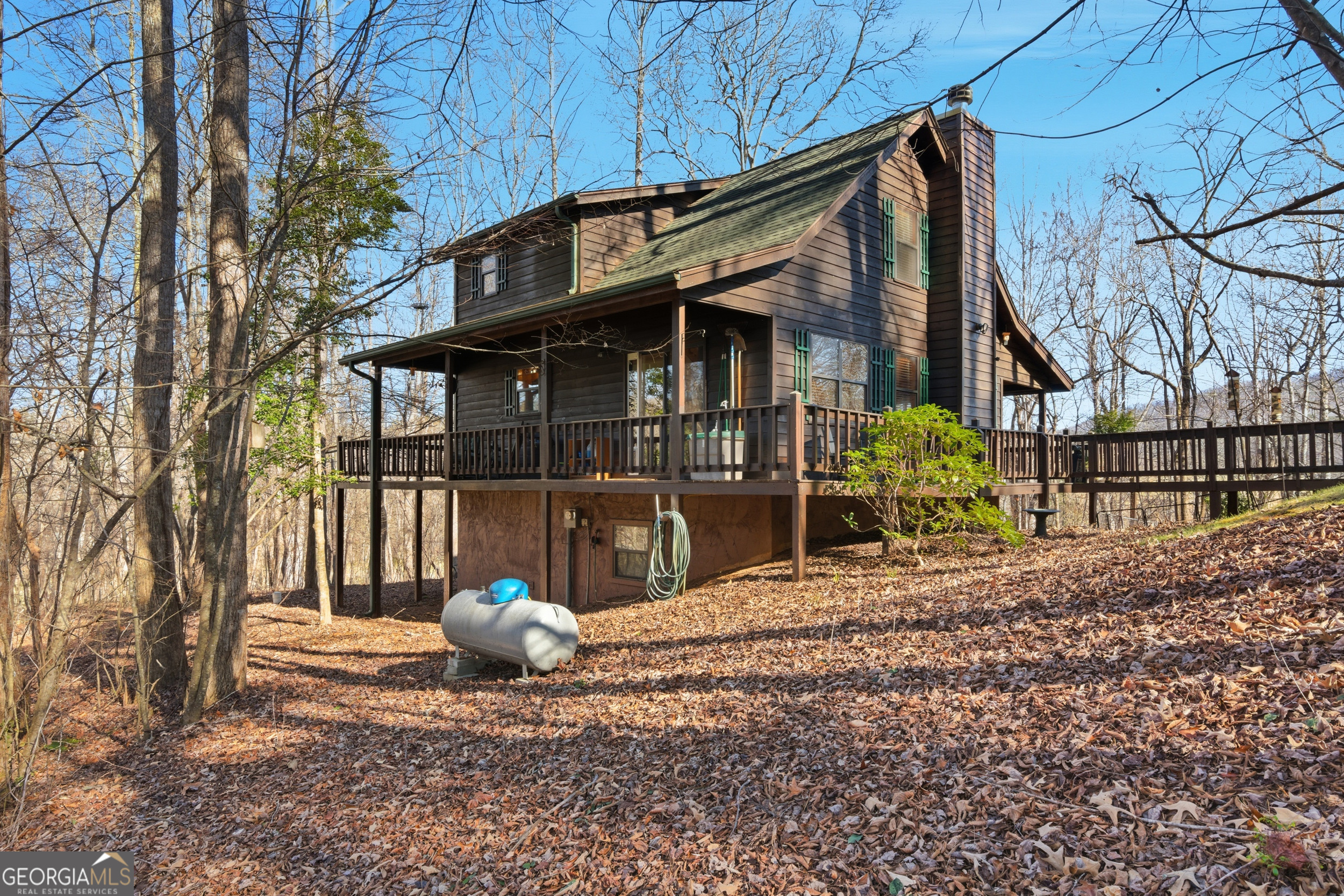 1637 Townsend Mill Road Young Harris, GA 30582 - Photo 45 of 57 a view of a house with backyard and sitting area