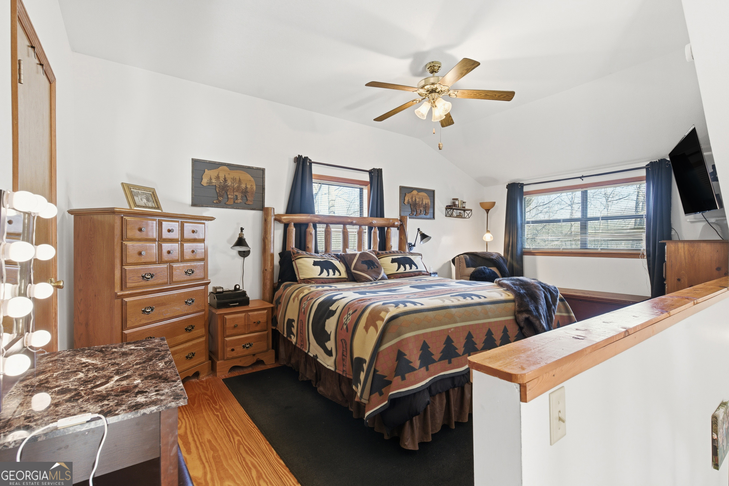 1637 Townsend Mill Road Young Harris, GA 30582 - Photo 5 of 57 a bedroom with a bed and a window