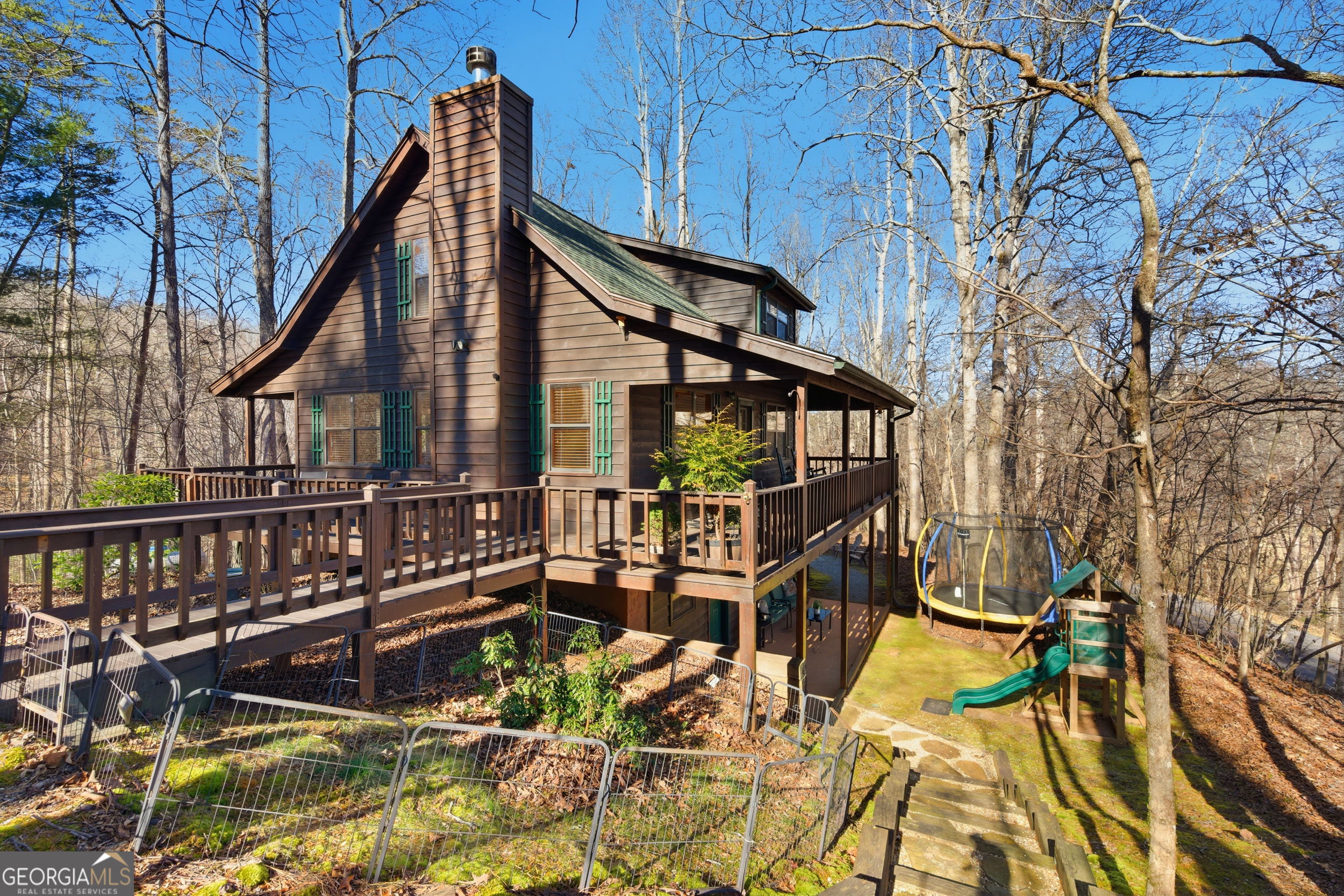 1637 Townsend Mill Road Young Harris, GA 30582 - Photo 51 of 57 a view of house with swimming pool and sitting area