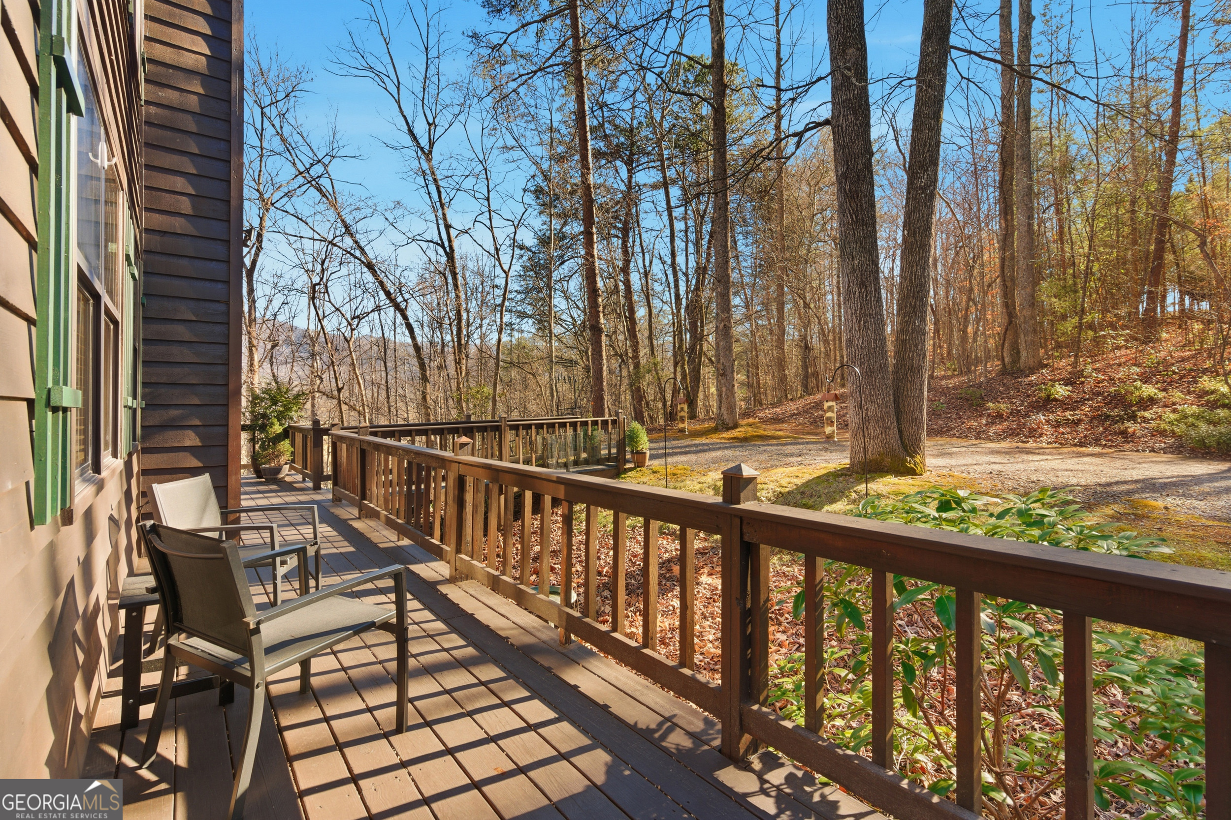 1637 Townsend Mill Road Young Harris, GA 30582 - Photo 55 of 57 a view of a balcony with wooden floor and fence