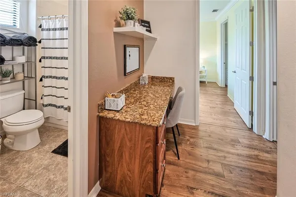 a view of bathroom with a toilet and a shower