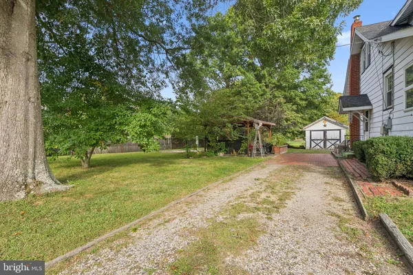 a view of a backyard with a garden