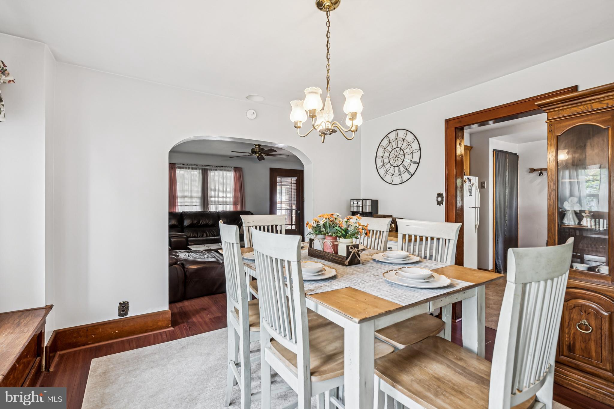 19 Sickler Street Quinton, NJ 08079 - Photo 9 of 25 a view of a dining room with furniture and a chandelier