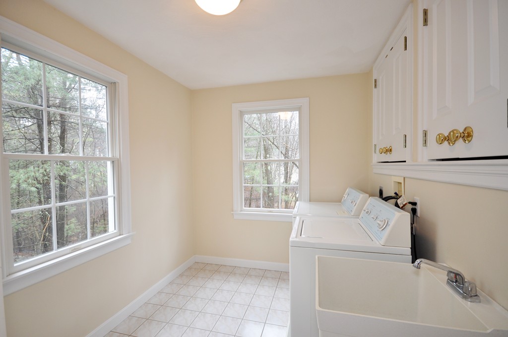 40 Battle Flagg Road Bedford, MA 01730 - Photo 24 of 30 a utility room with dryer and washer