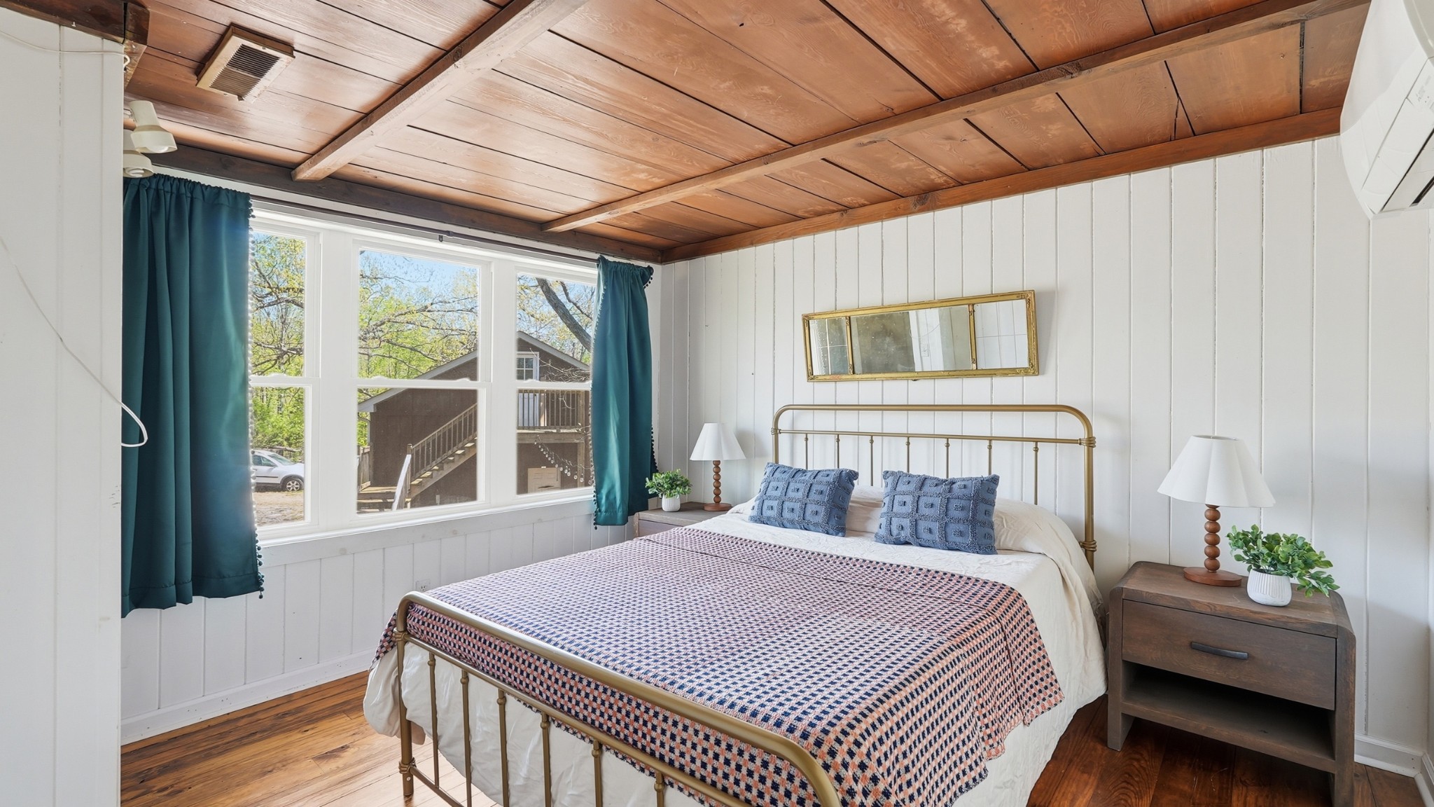 7915 Ridgewood Road Goodlettsville, TN 37072 - Photo 29 of 49 a bedroom with a bed wooden floor and window