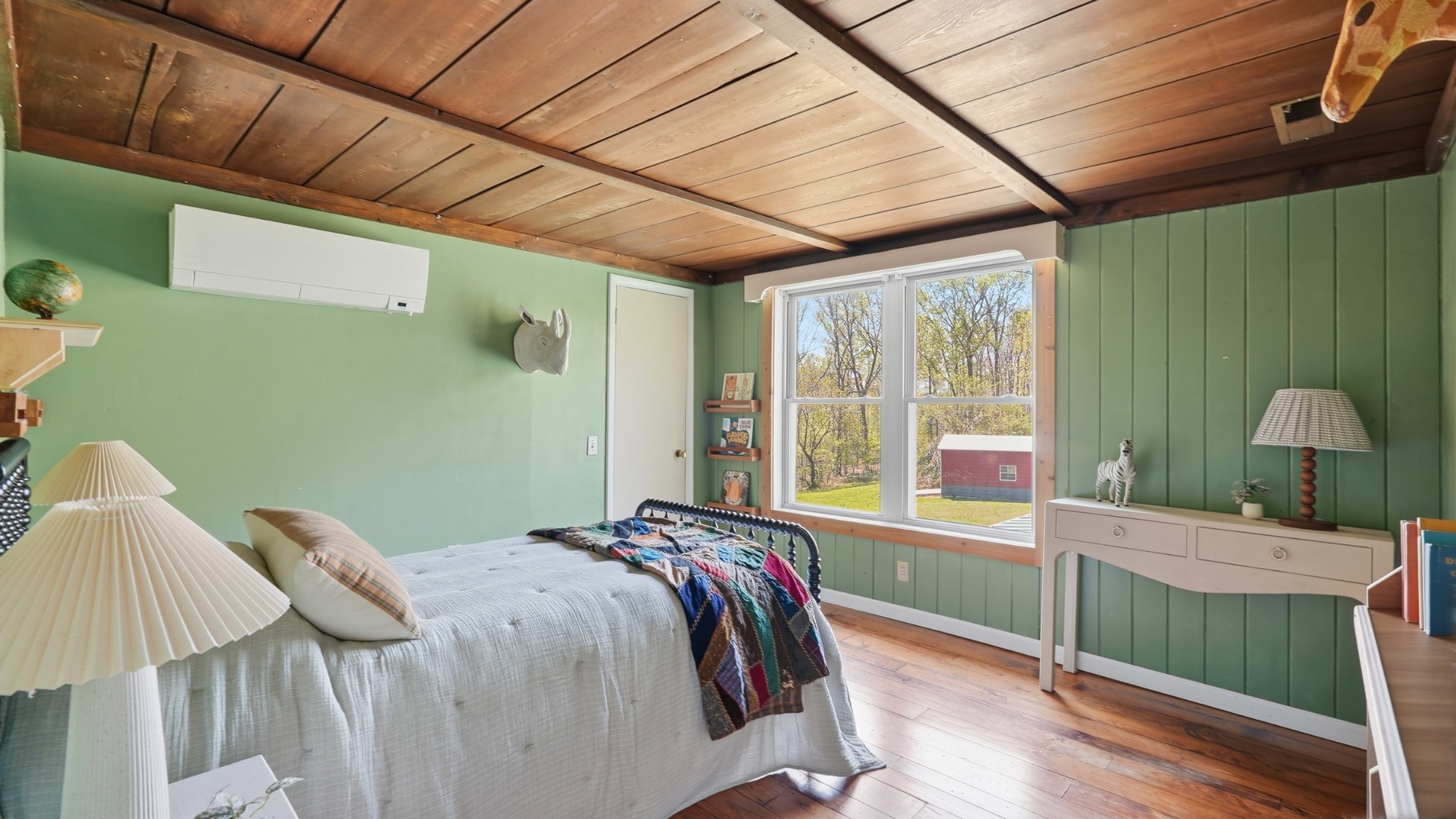 7915 Ridgewood Road Goodlettsville, TN 37072 - Photo 31 of 49 a bed sitting in a bedroom next to a window