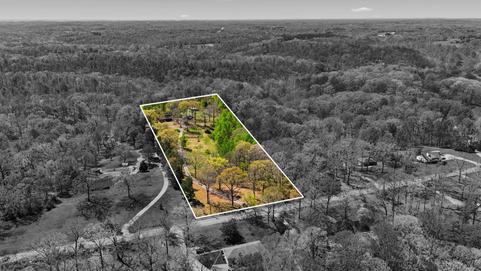 7915 Ridgewood Road Goodlettsville, TN 37072 - Photo 46 of 49 an aerial view of a house with a yard and trees