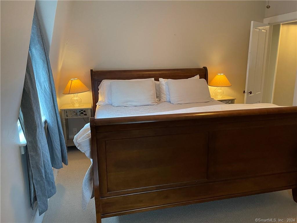 51 Front Street Groton, CT 06340 - Photo 19 of 21 a bathroom with a sink and mirror