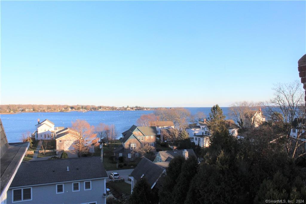 51 Front Street Groton, CT 06340 - Photo 3 of 21 an aerial view of residential houses with outdoor space and trees