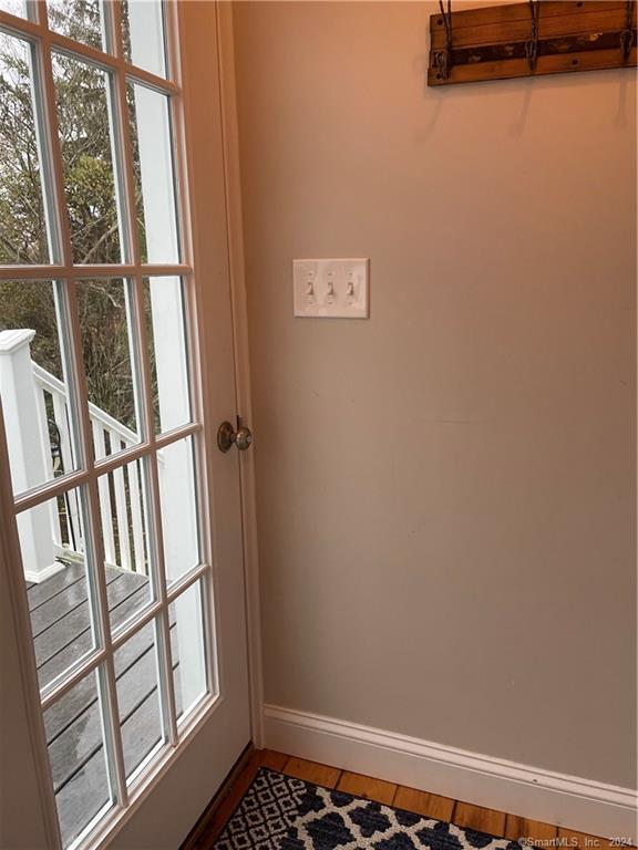 51 Front Street Groton, CT 06340 - Photo 5 of 21 a view of an empty room with a window
