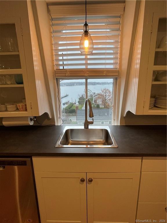 51 Front Street Groton, CT 06340 - Photo 7 of 21 a kitchen with a sink and a window