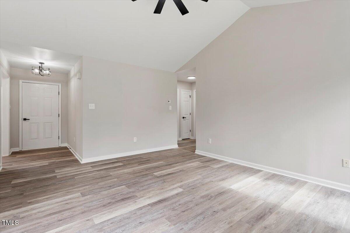 1480 White Memorial Church Road Willow Spring, NC 27592 - Photo 6 of 23 wooden floor in an empty room