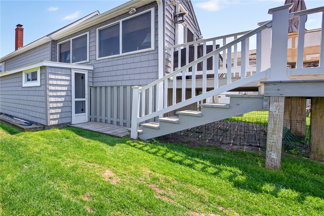 6 Arbeth Road Narragansett, RI 02879 - Photo 31 of 38 Stairs leading from back deck to the enclosed outdoor shower