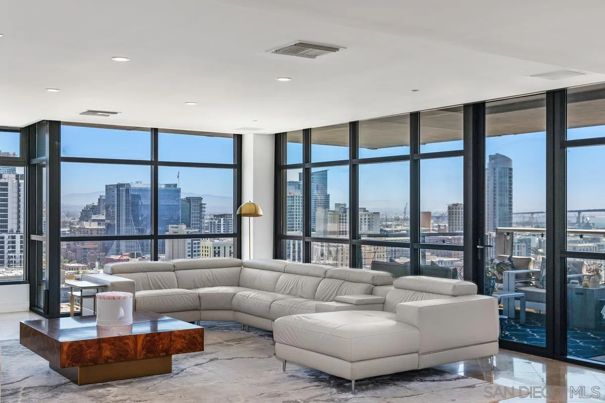 645 Front Street, Unit 2004 San Diego, CA 92101 - Photo 9 of 47 a living room with furniture and a large window