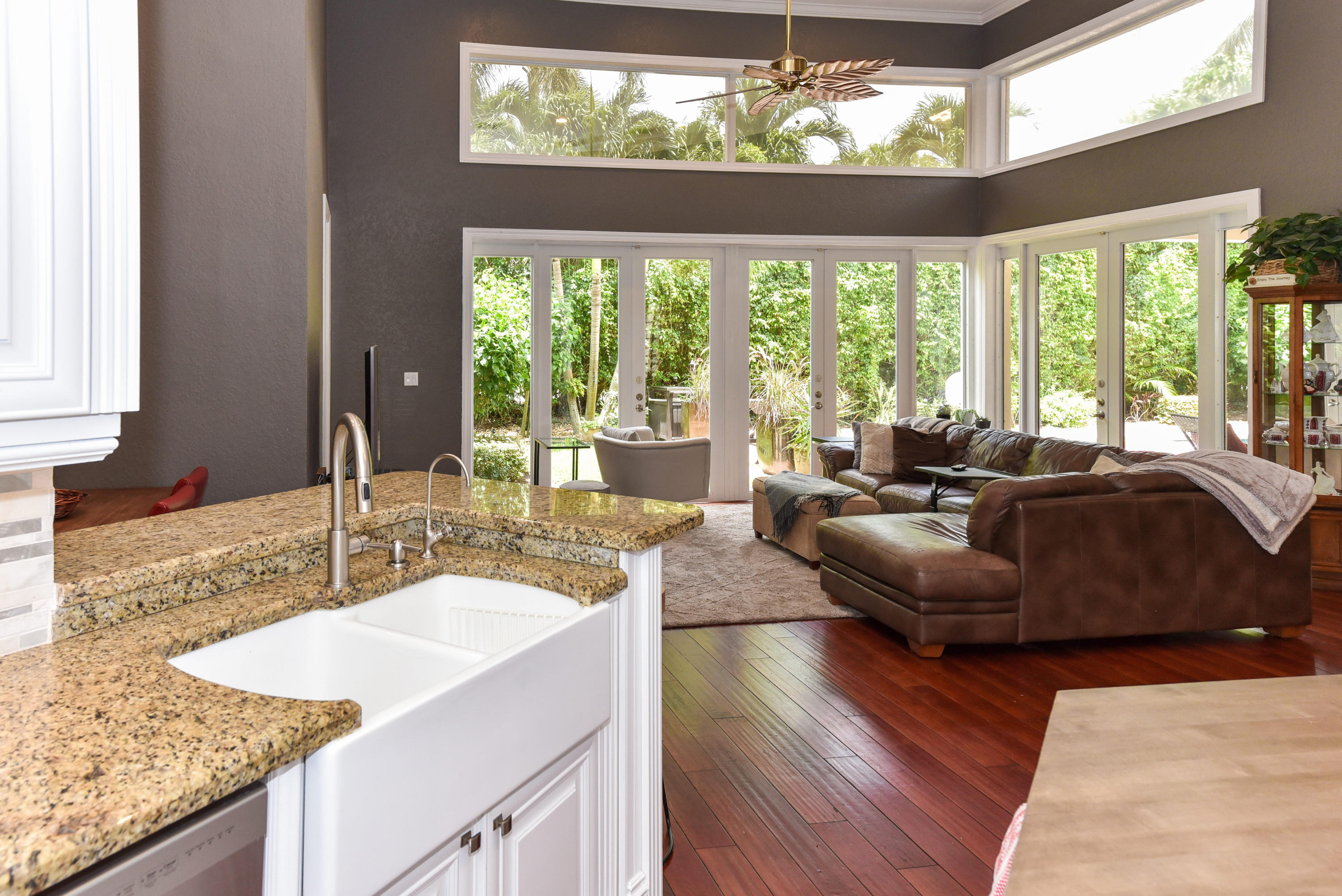 5855 Paddington Way Boca Raton, FL 33496 - Photo 12 of 40 a living room with furniture and a large window