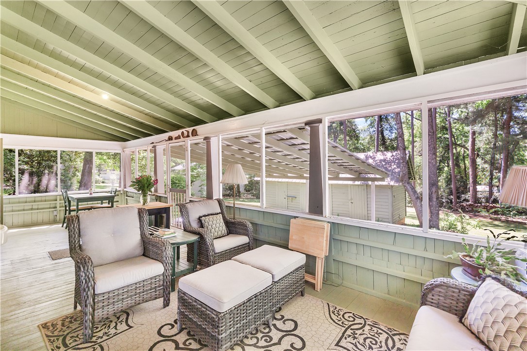 205 West Mauldin Street Walhalla, SC 29691 - Photo 30 of 43 A spacious, enclosed porch offers tranquil views of the surrounding natural landscape, and is directly connected to the wrap around porch.