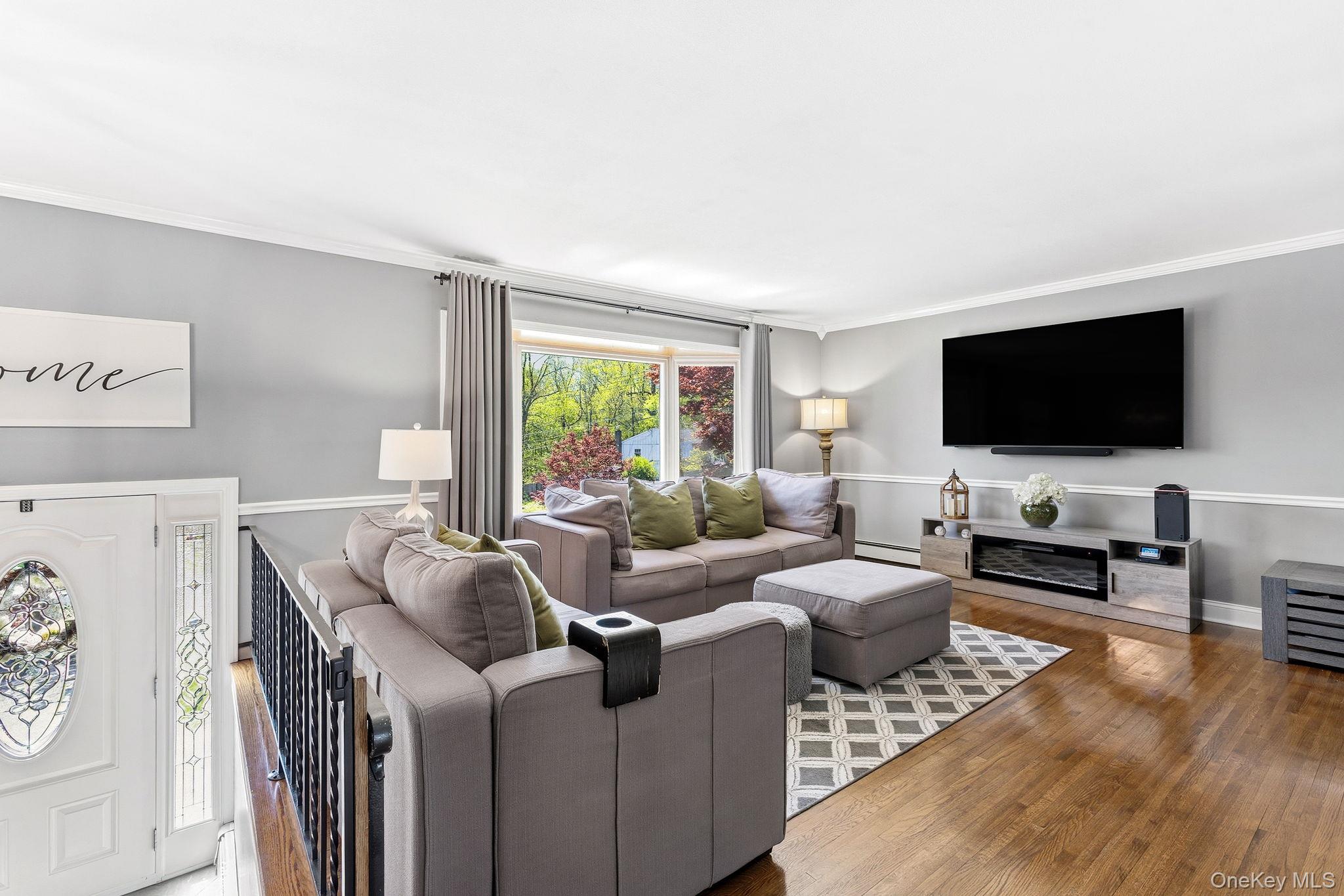 56 Tanager Road Mahopac, NY 10541 - Photo 4 of 30 a living room with furniture and a flat screen tv
