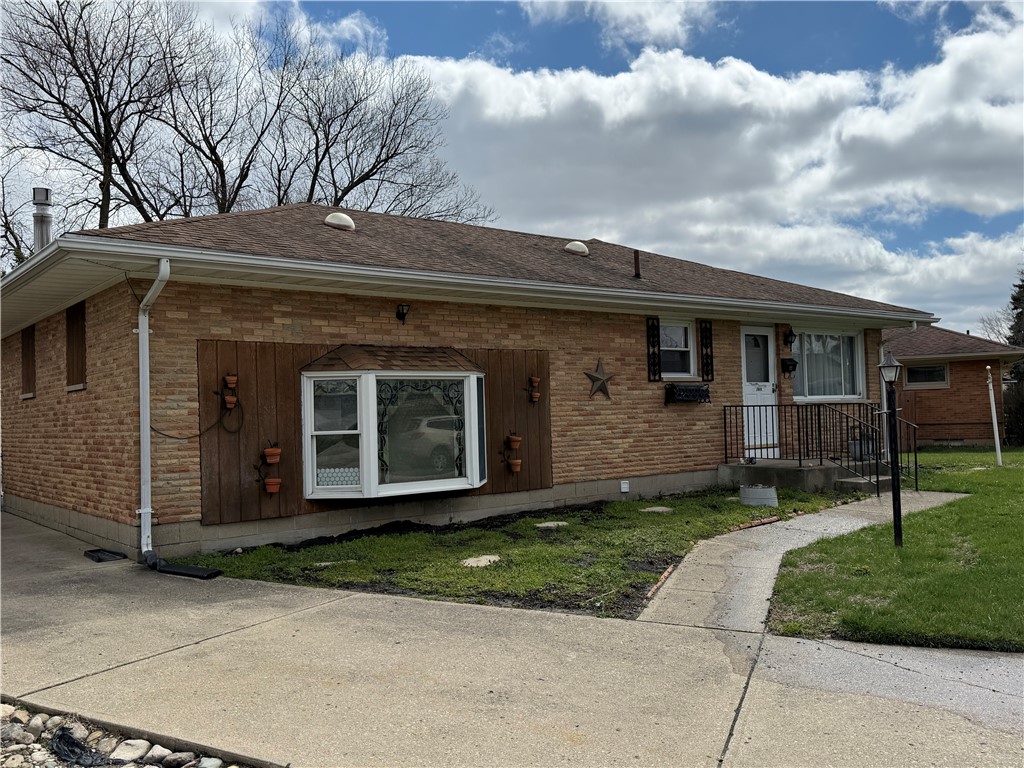 4732 Lehigh Drive Springfield, OH 45503 - Photo 23 of 27 This charming brick home features a welcoming bay window and an inviting entryway.