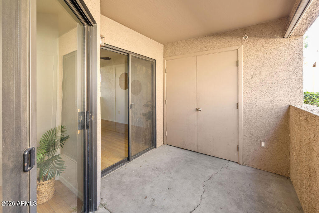 1287 North Alma School Road, Unit 123 Chandler, AZ 85224 - Photo 18 of 26 an empty room with windows and closet