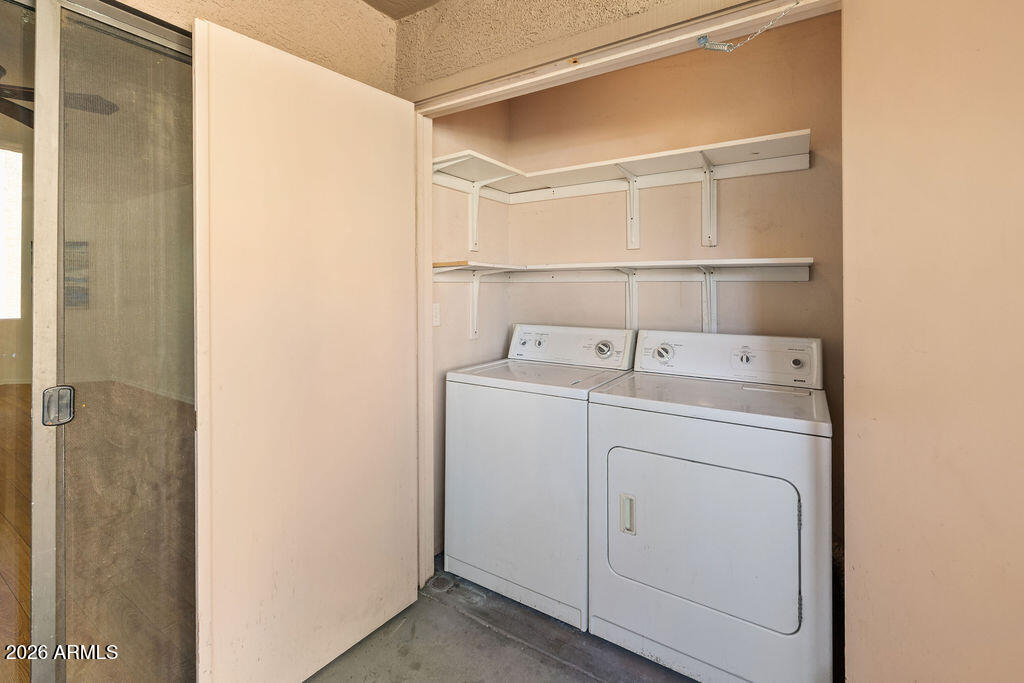 1287 North Alma School Road, Unit 123 Chandler, AZ 85224 - Photo 19 of 26 a utility room with dryer and washer