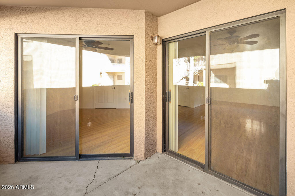 1287 North Alma School Road, Unit 123 Chandler, AZ 85224 - Photo 20 of 26 a view of a glass door with glass door