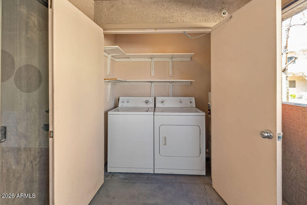 1287 North Alma School Road, Unit 123 Chandler, AZ 85224 - Photo 21 of 26 a utility room with dryer and washer