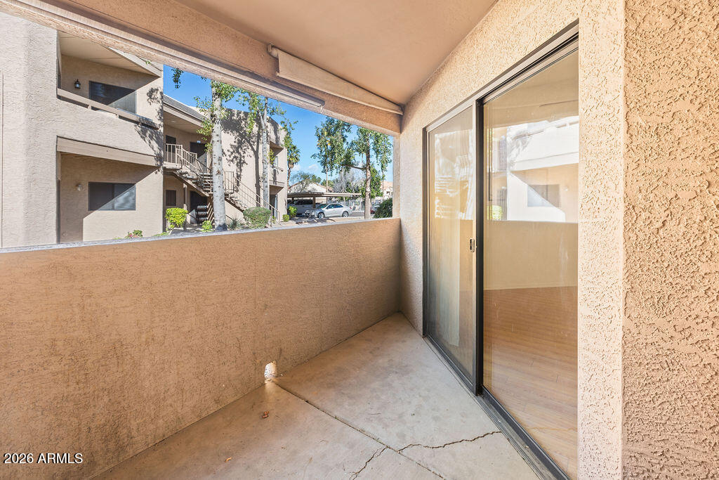 1287 North Alma School Road, Unit 123 Chandler, AZ 85224 - Photo 22 of 26 a view of a large window with an outdoor space