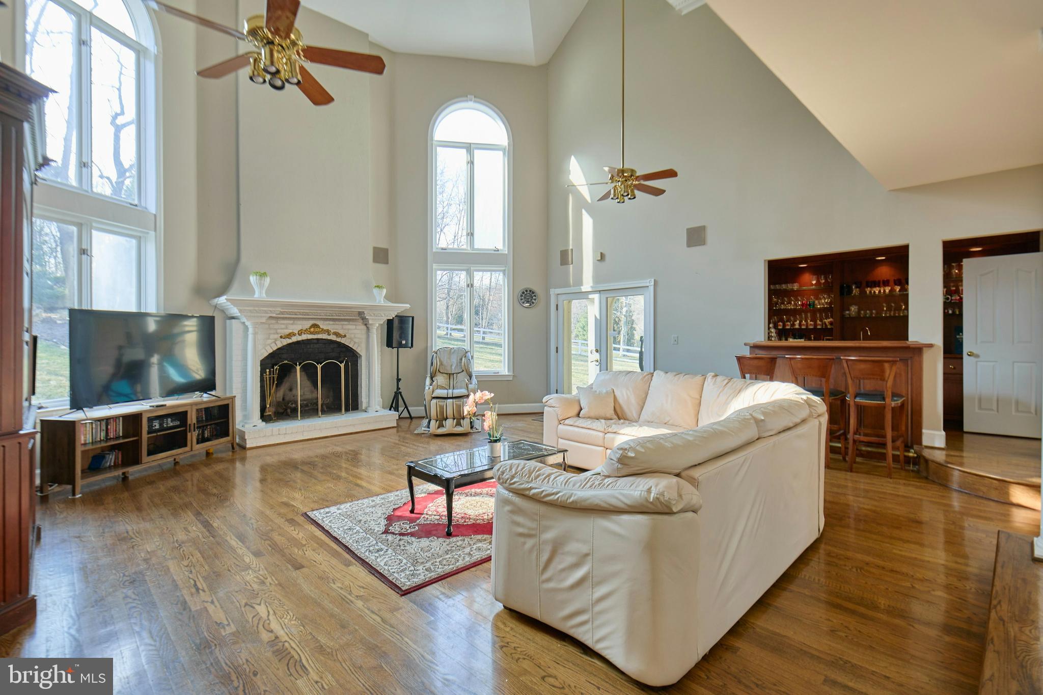 6830 Clifton Road Clifton, VA 20124 - Photo 18 of 85 Two story family room with fireplace