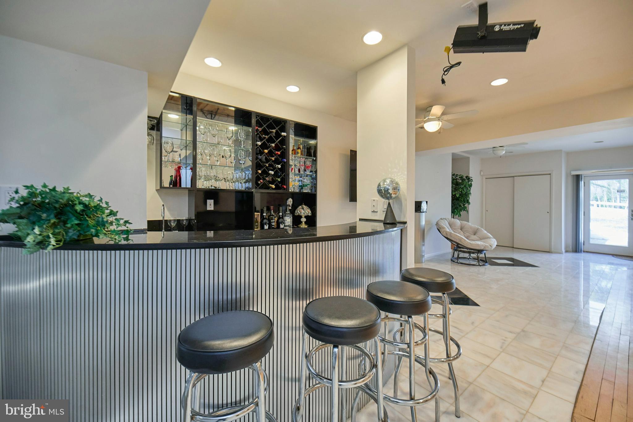 6830 Clifton Road Clifton, VA 20124 - Photo 50 of 85 Lower level bar area