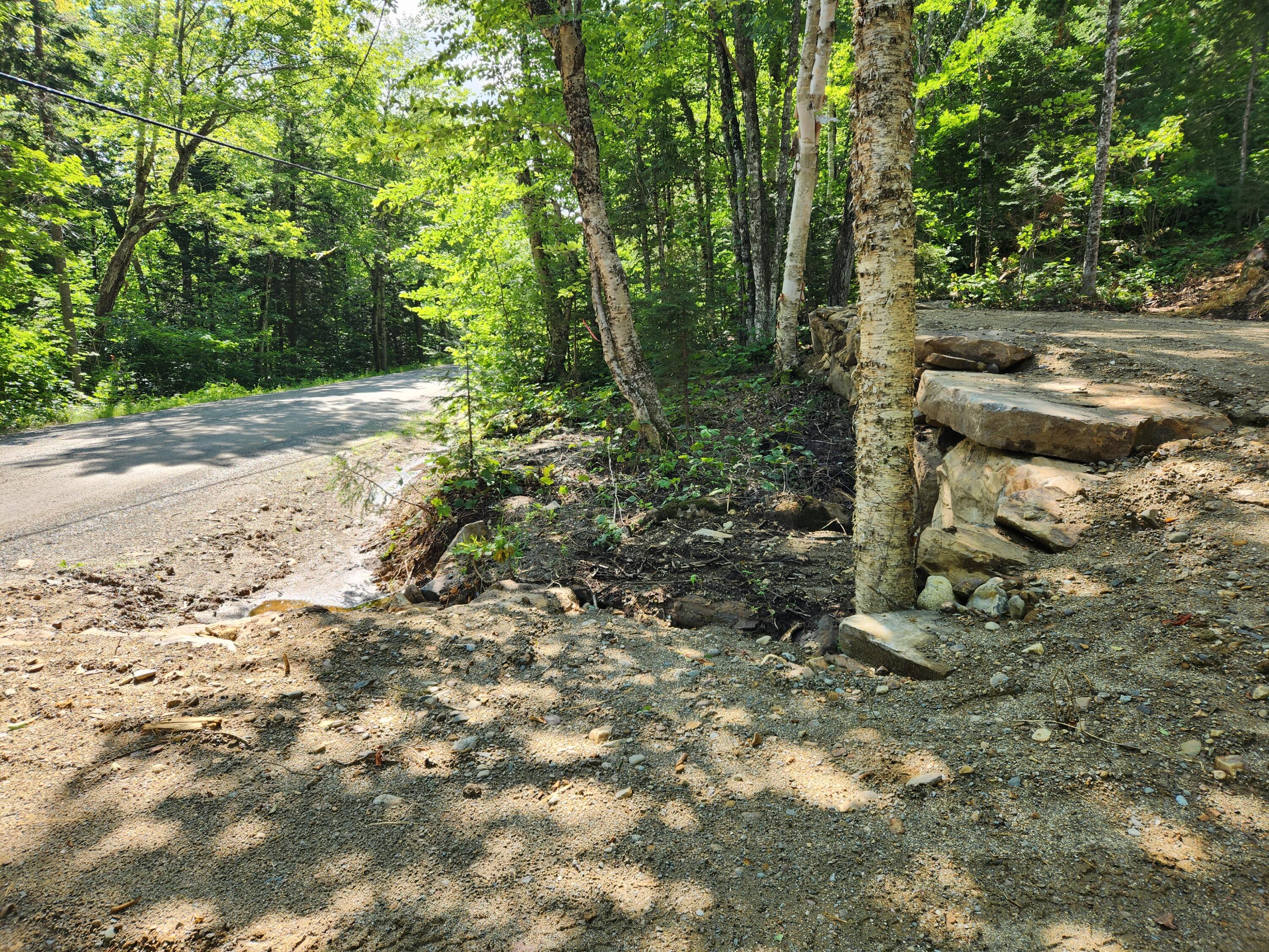 18-19 Edelheid Road Sandy River Plt, ME 04970 - Photo 7 of 11 Retaining Wall