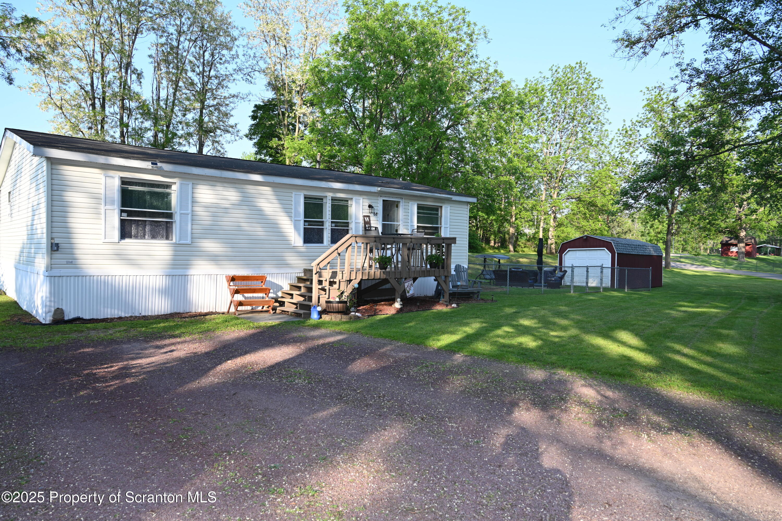 a view of a backyard of the house