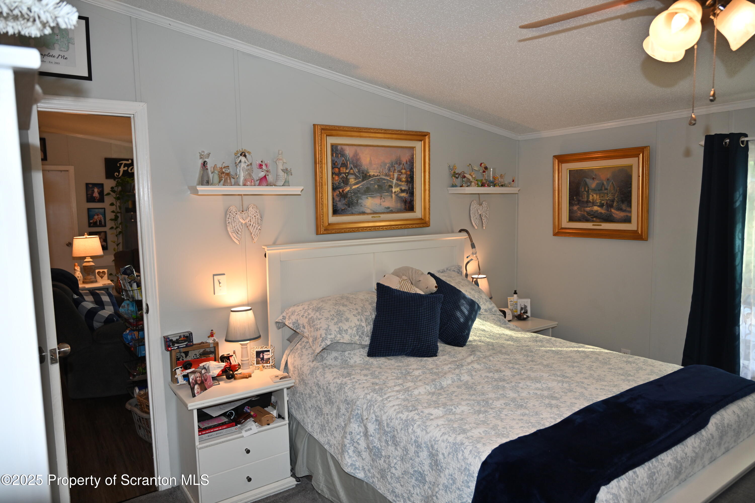 68 Spring Street Great Bend, PA 18821 - Photo 15 of 32 a bedroom with a bed and a lamp on dresser