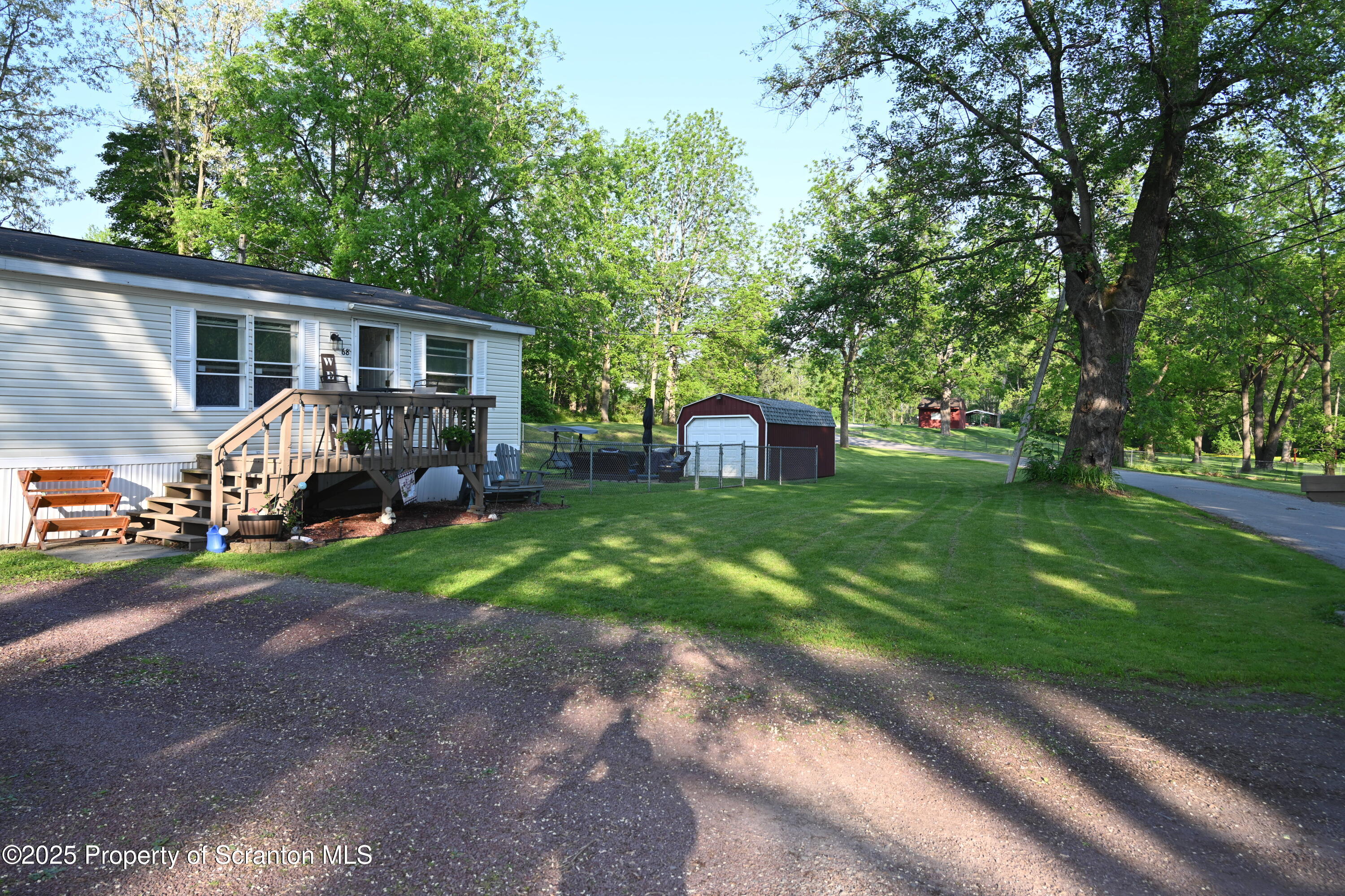 68 Spring Street Great Bend, PA 18821 - Photo 25 of 32 a view of a house with backyard