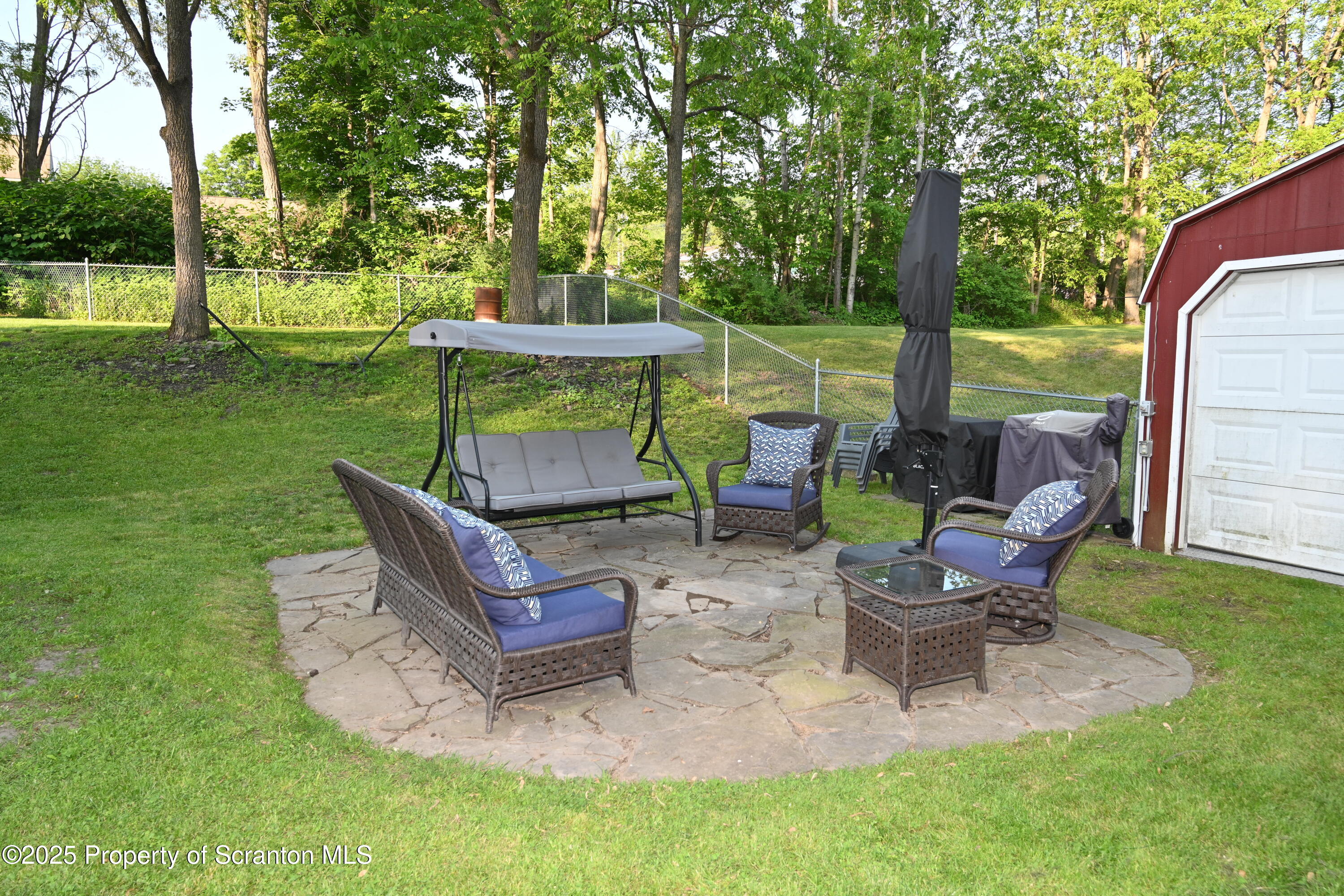 68 Spring Street Great Bend, PA 18821 - Photo 27 of 32 a view of garden with patio
