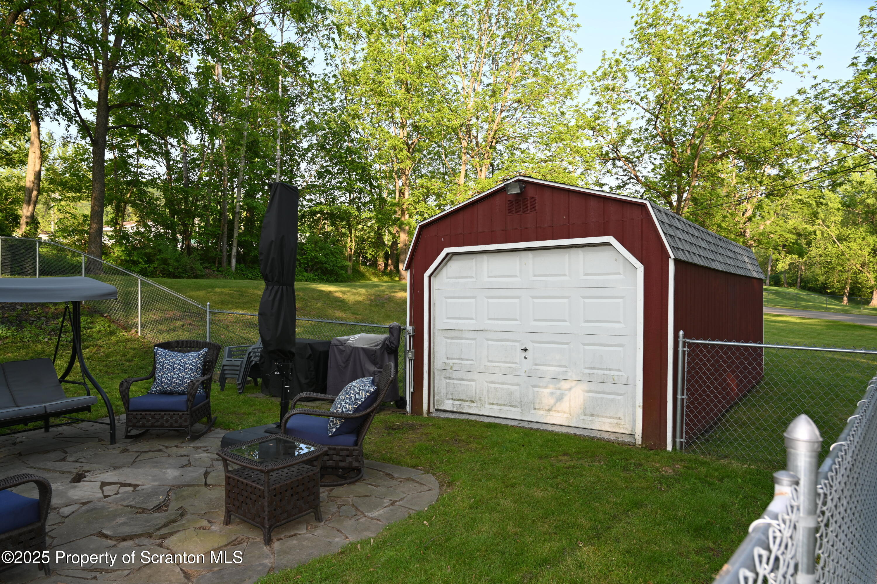 68 Spring Street Great Bend, PA 18821 - Photo 28 of 32 a front view of a house with garden