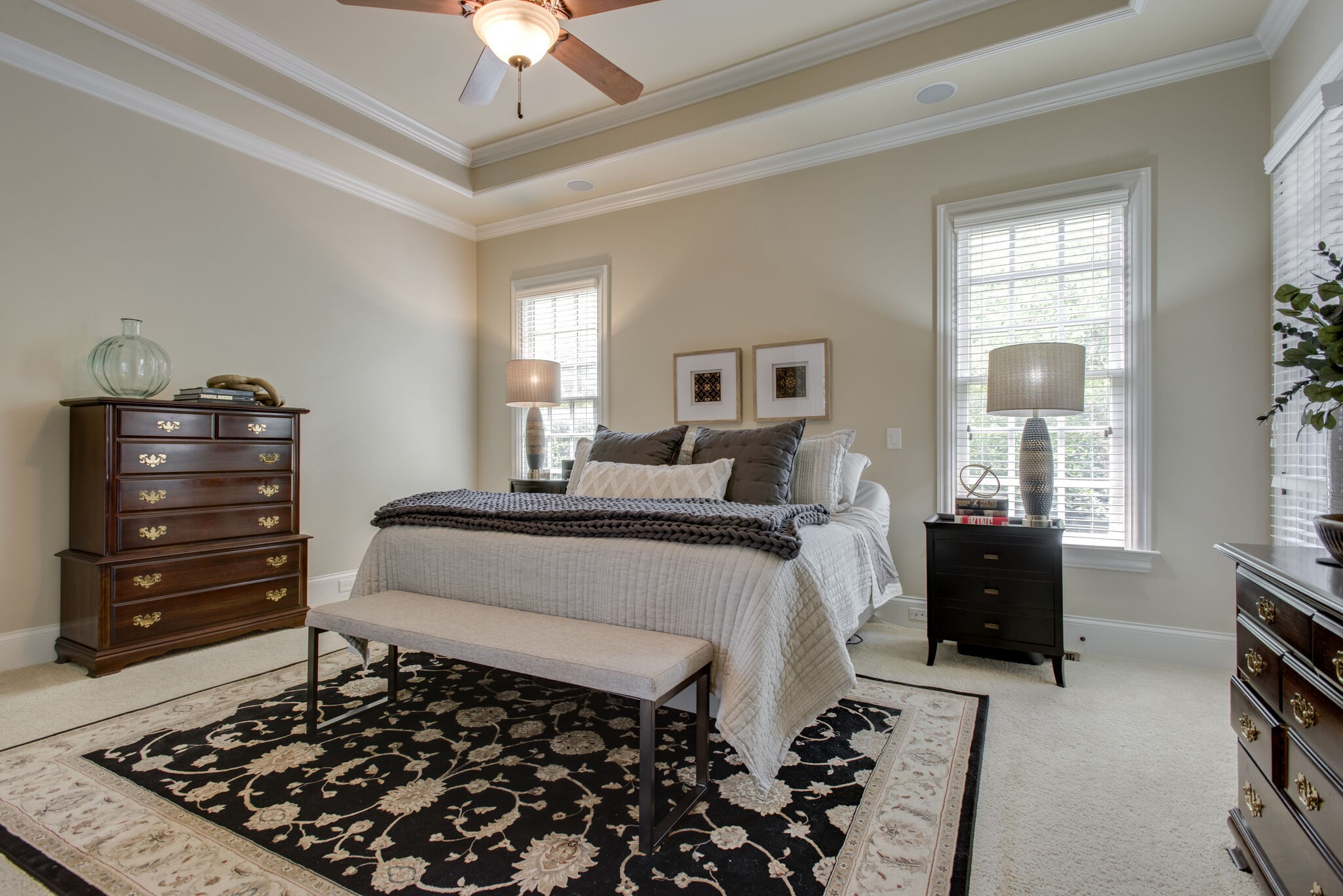 333 Whitewater Way Franklin, TN 37064 - Photo 19 of 39 a bedroom with a bed and a chandelier