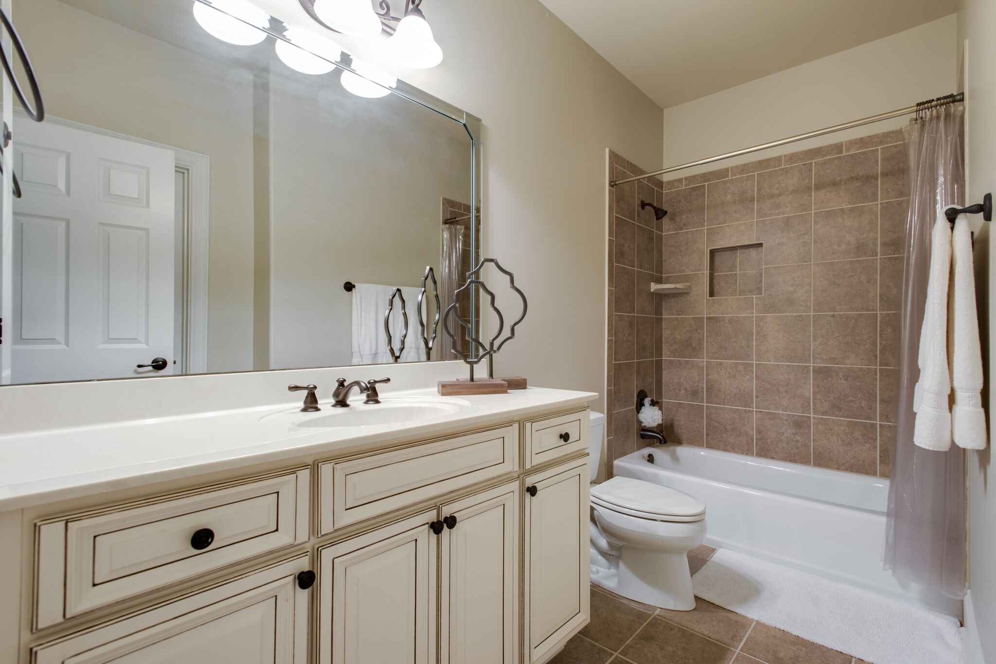 333 Whitewater Way Franklin, TN 37064 - Photo 28 of 39 a bathroom with a sink a toilet and shower
