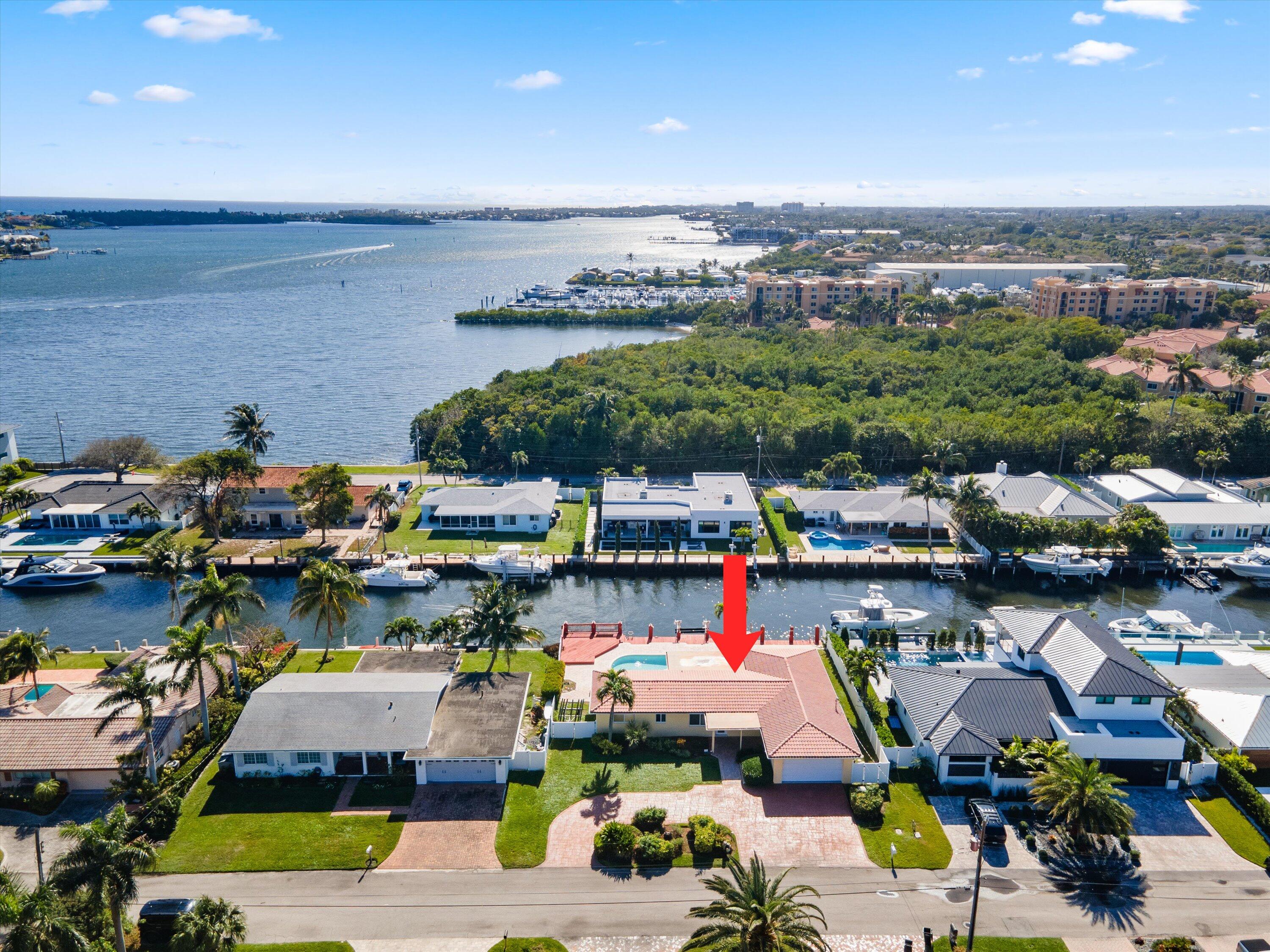 161 Neptune Drive Hypoluxo, FL 33462 - Photo 25 of 31 161 Neptune Aerial Southarrow