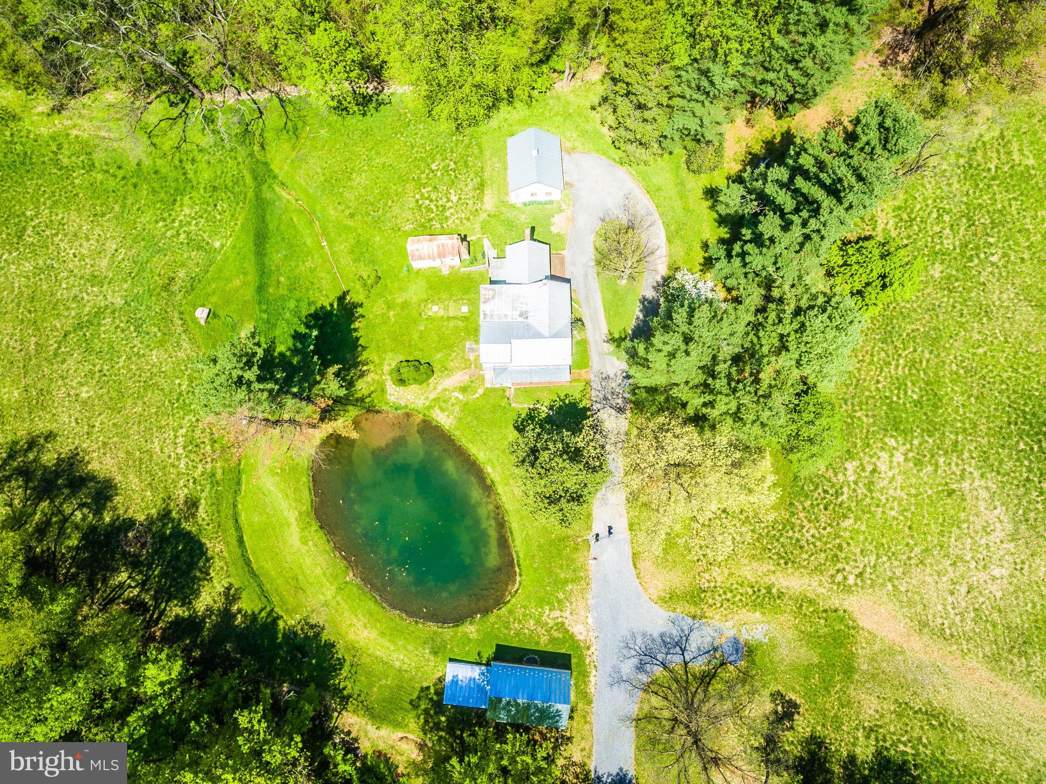 6938 Bowers Road Frederick, MD 21702 - Photo 4 of 40 an aerial view of a residential houses with yard