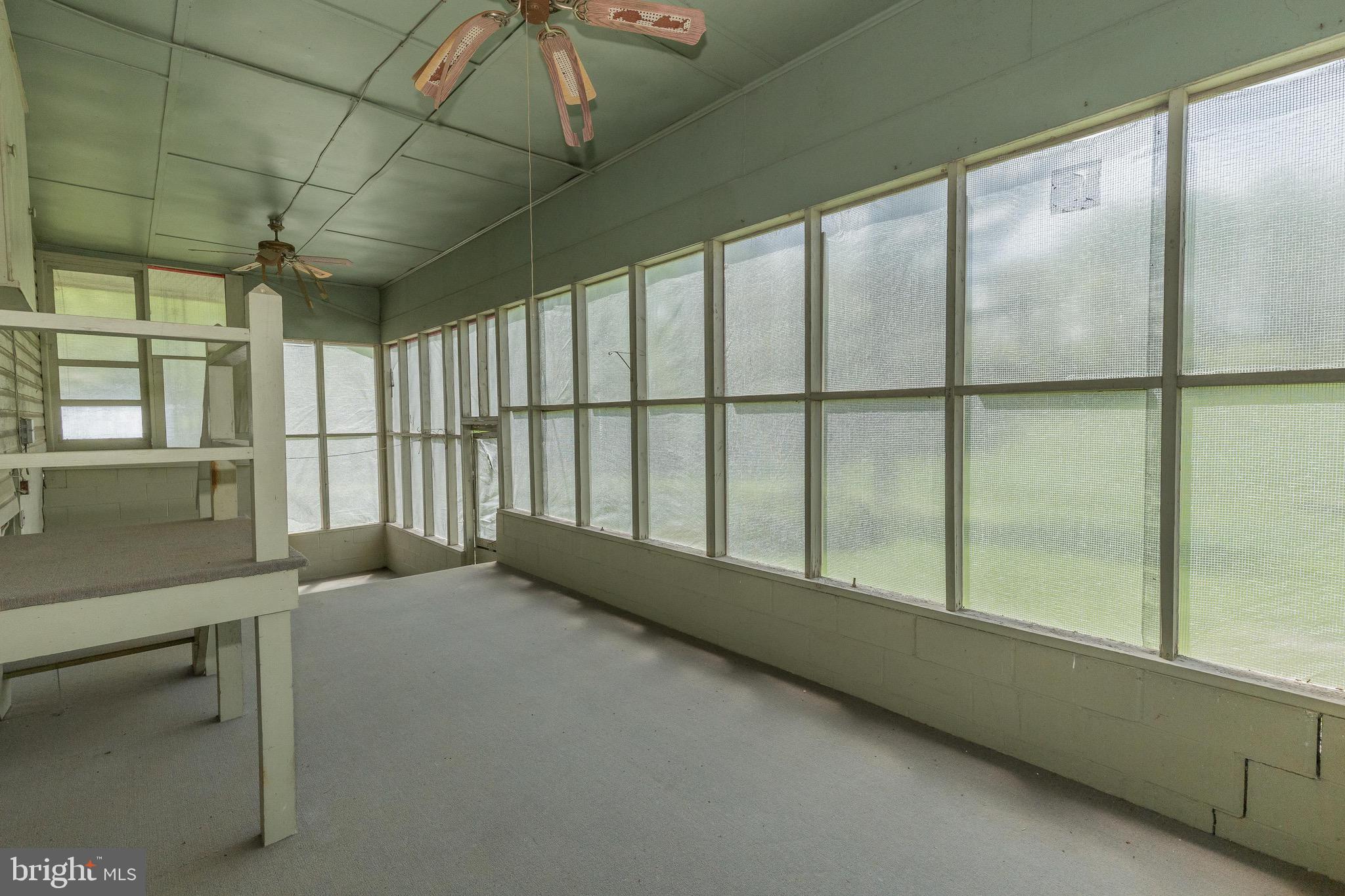 6938 Bowers Road Frederick, MD 21702 - Photo 33 of 40 a view of an empty room with a window