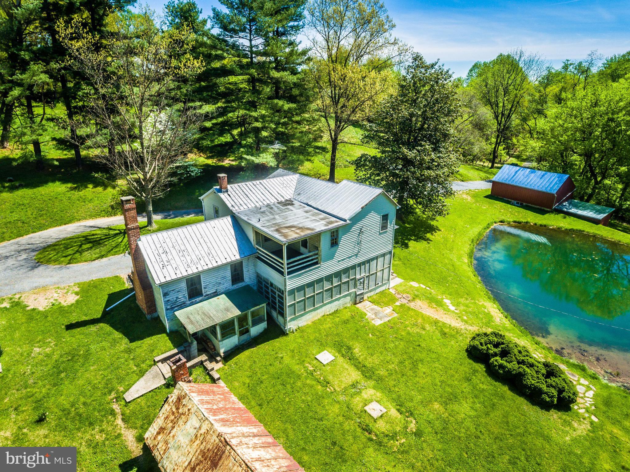 6938 Bowers Road Frederick, MD 21702 - Photo 9 of 40 an aerial view of a house with swimming pool garden and patio